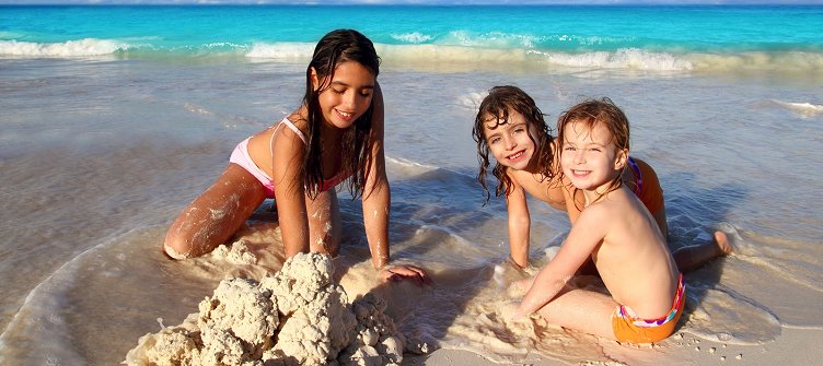 Children having fun on the beach