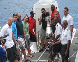 CFL players and official challenge cup as they prepare to take the plunge