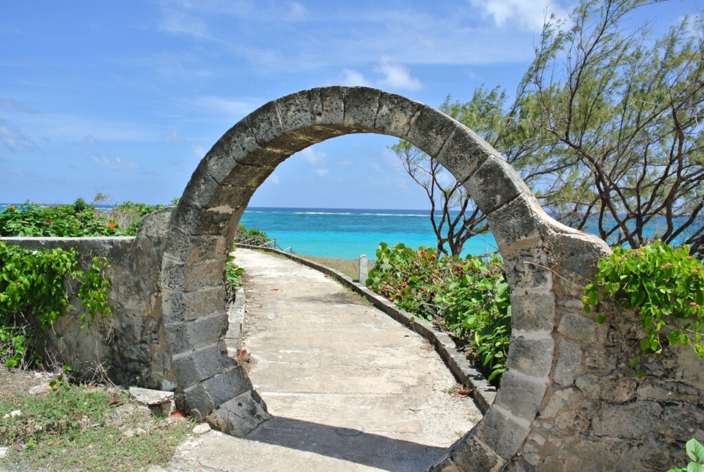 Walking from sam lords castle you pass arches of coral that frame the beach and ocean 