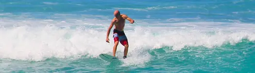 🏄🏽 Surfing