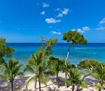 View from the condo terrace of the ocean, beach and trees