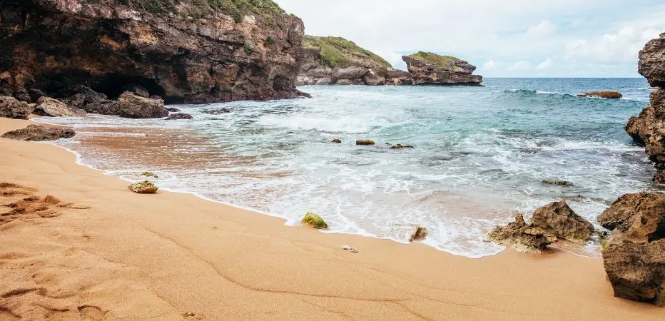 The sheltered beach at Archers Bay surrounded by cliffs