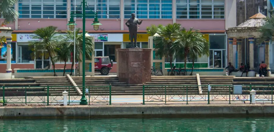 Looking across the careenage to the statue of Errol Barrow in Independence Square