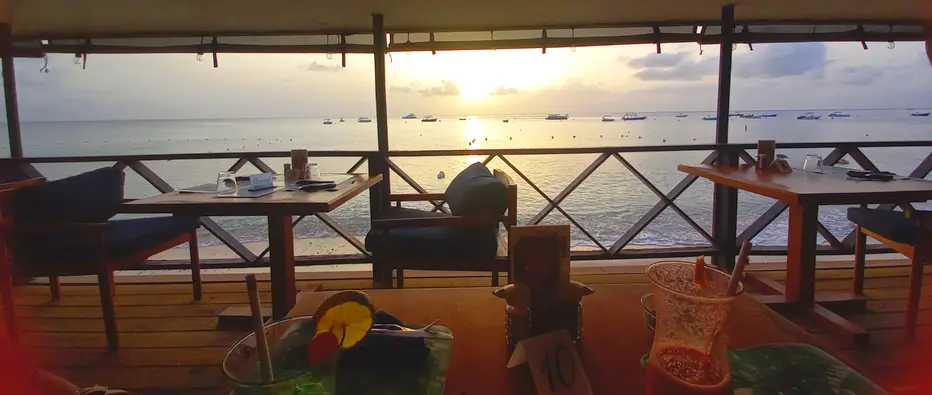 Sunset beachfront dining in Holetown