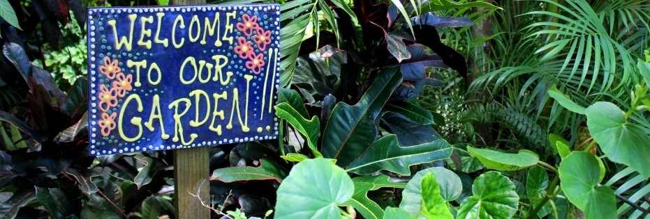 Sign welcoming visitors to Flower Forest Botanical Gardens
