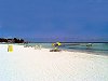 A gorgeous white sand beach with calm gentle waters - perfect for swimming!