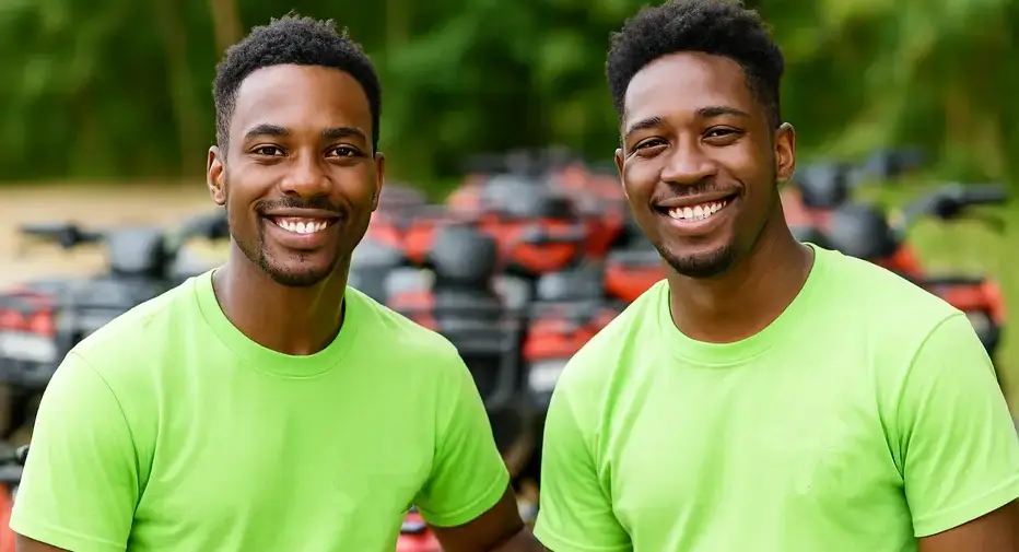 Two young ATV guides smiling